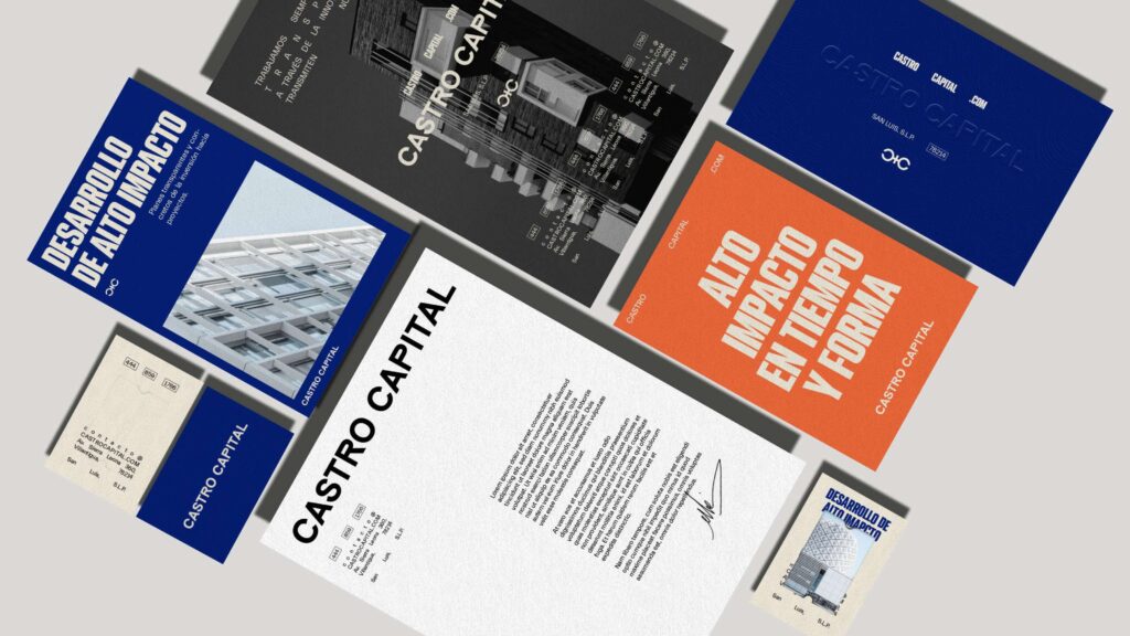 Printed materials with bold typography, illustrating structured yet creative brand development.
